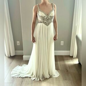 Crystal beaded long gown with tail